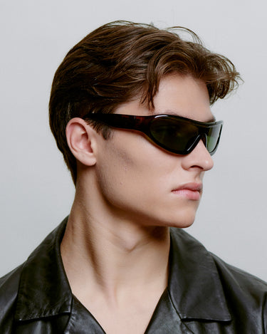 Brune sport A.Kjærbede solbriller med grøn glas - på siden herre